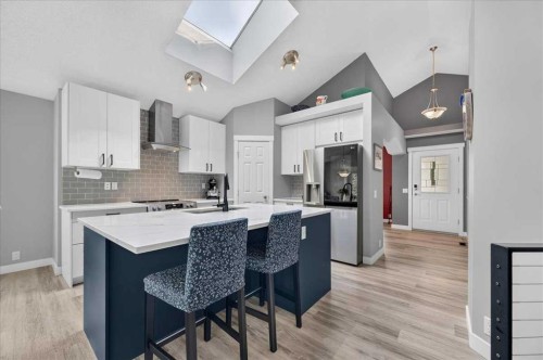 212 Cresthaven Place Sw, Calgary, AB - Indoor Photo Showing Kitchen With Stainless Steel Kitchen With Upgraded Kitchen
