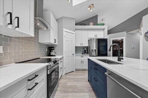212 Cresthaven Place Sw, Calgary, AB - Indoor Photo Showing Kitchen With Double Sink With Upgraded Kitchen