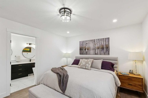 14 Butte Place Nw, Calgary, AB - Indoor Photo Showing Bedroom