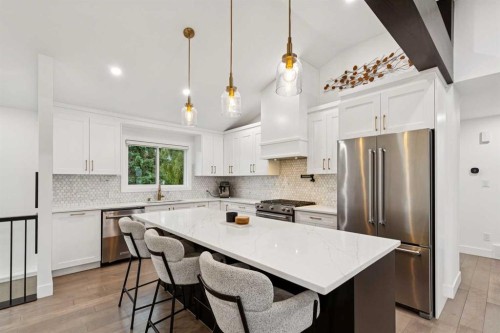 14 Butte Place Nw, Calgary, AB - Indoor Photo Showing Kitchen With Upgraded Kitchen