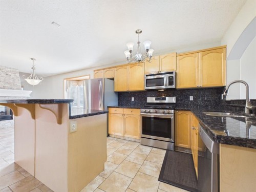 181 Panamount Hill Nw, Calgary, AB - Indoor Photo Showing Kitchen With Stainless Steel Kitchen