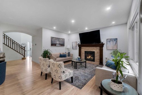 109 Evanscove Heights, Calgary, AB - Indoor Photo Showing Living Room With Fireplace