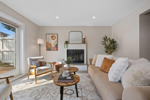 19 Macewan Meadow Crescent Nw, Calgary, AB - Indoor Photo Showing Living Room With Fireplace