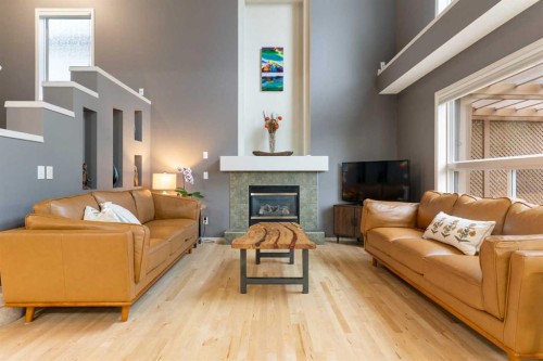 131 Valley Stream Close Nw, Calgary, AB - Indoor Photo Showing Living Room With Fireplace