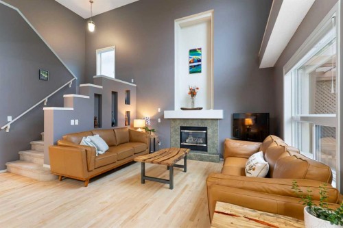 131 Valley Stream Close Nw, Calgary, AB - Indoor Photo Showing Living Room With Fireplace