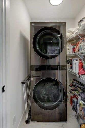 174 Rowley Gate Nw, Calgary, AB - Indoor Photo Showing Laundry Room