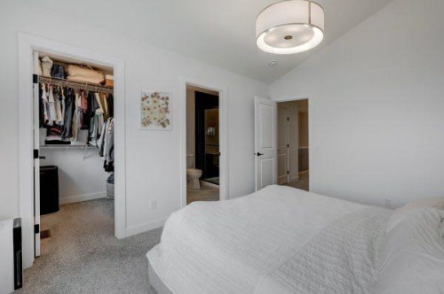 174 Rowley Gate Nw, Calgary, AB - Indoor Photo Showing Bedroom