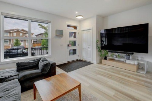 174 Rowley Gate Nw, Calgary, AB - Indoor Photo Showing Living Room