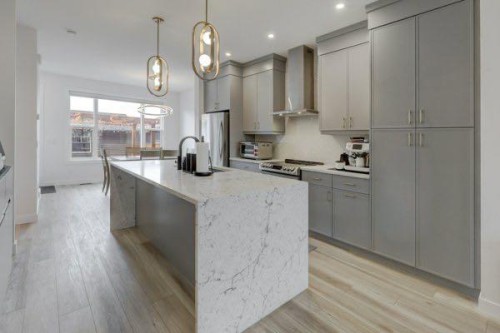 174 Rowley Gate Nw, Calgary, AB - Indoor Photo Showing Kitchen With Upgraded Kitchen