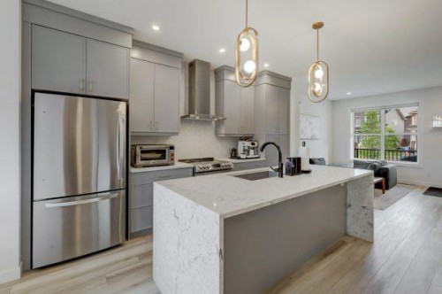 174 Rowley Gate Nw, Calgary, AB - Indoor Photo Showing Kitchen With Stainless Steel Kitchen With Upgraded Kitchen