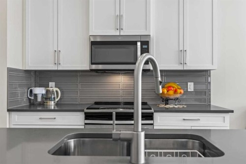 119 Walgrove Green Se, Calgary, AB - Indoor Photo Showing Kitchen With Double Sink