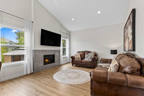 119 Walgrove Green Se, Calgary, AB - Indoor Photo Showing Living Room With Fireplace