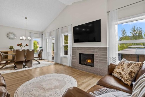 119 Walgrove Green Se, Calgary, AB - Indoor Photo Showing Living Room With Fireplace