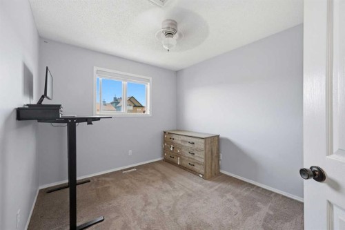 33 Saddlecrest Close Ne, Calgary, AB - Indoor Photo Showing Other Room