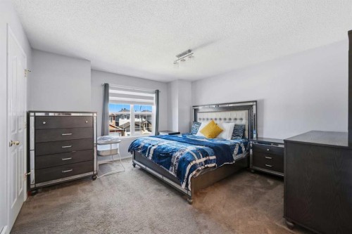 33 Saddlecrest Close Ne, Calgary, AB - Indoor Photo Showing Bedroom