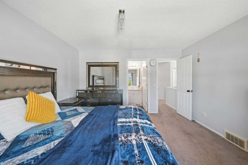 33 Saddlecrest Close Ne, Calgary, AB - Indoor Photo Showing Bedroom