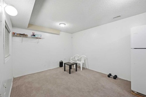 33 Saddlecrest Close Ne, Calgary, AB - Indoor Photo Showing Other Room