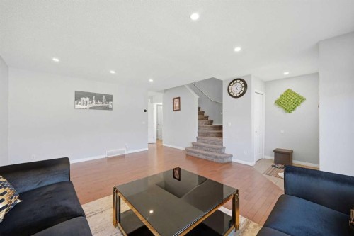 33 Saddlecrest Close Ne, Calgary, AB - Indoor Photo Showing Living Room