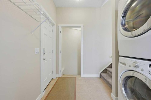 98 Elgin Meadows Circle Se, Calgary, AB - Indoor Photo Showing Laundry Room