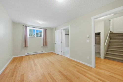98 Elgin Meadows Circle Se, Calgary, AB - Indoor Photo Showing Other Room
