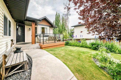 61 West Edge Road, Cochrane, AB - Outdoor With Deck Patio Veranda