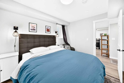 61 West Edge Road, Cochrane, AB - Indoor Photo Showing Bedroom