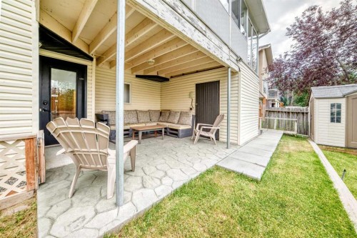 61 West Edge Road, Cochrane, AB - Outdoor With Deck Patio Veranda With Exterior