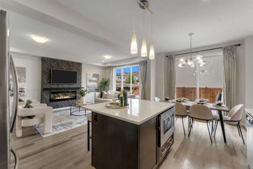 121 Osborne Common Sw, Airdrie, AB - Indoor With Fireplace