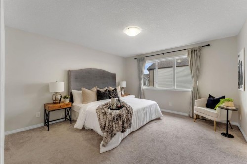 121 Osborne Common Sw, Airdrie, AB - Indoor Photo Showing Bedroom