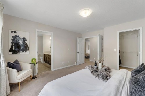 121 Osborne Common Sw, Airdrie, AB - Indoor Photo Showing Bedroom