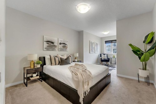 121 Osborne Common Sw, Airdrie, AB - Indoor Photo Showing Bedroom
