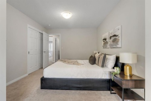 121 Osborne Common Sw, Airdrie, AB - Indoor Photo Showing Bedroom
