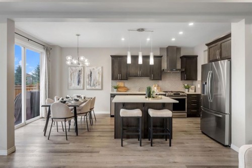 121 Osborne Common Sw, Airdrie, AB - Indoor Photo Showing Kitchen With Upgraded Kitchen