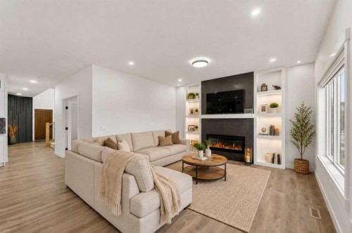 67 Lakes Estates Circle, Strathmore, AB - Indoor Photo Showing Living Room With Fireplace
