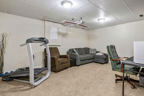 2004 4 Avenue Se, High River, AB - Indoor Photo Showing Gym Room