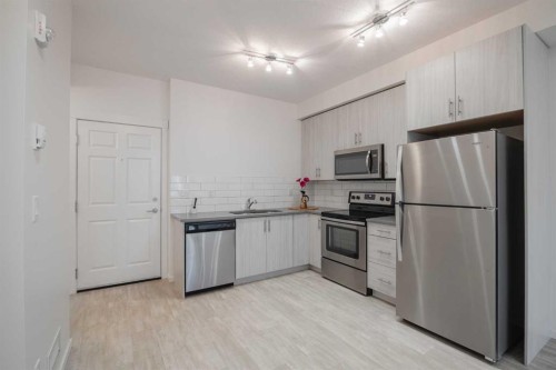 4309-215 Legacy Boulevard Se, Calgary, AB - Indoor Photo Showing Kitchen With Stainless Steel Kitchen