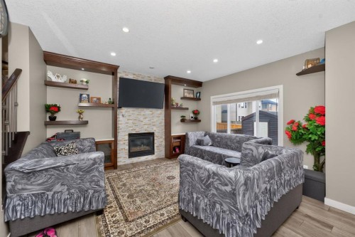 93 Skyview Shores Terrace Ne, Calgary, AB - Indoor Photo Showing Living Room With Fireplace