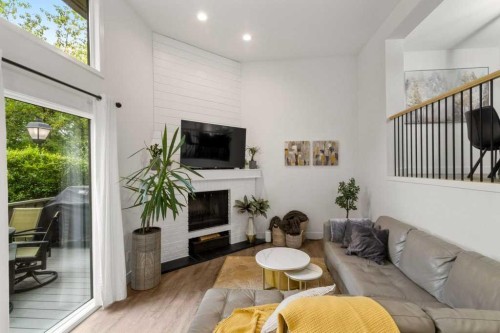 3909 Point Mckay Road Nw, Calgary, AB - Indoor Photo Showing Other Room With Fireplace