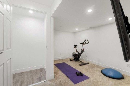 3909 Point Mckay Road Nw, Calgary, AB - Indoor Photo Showing Gym Room