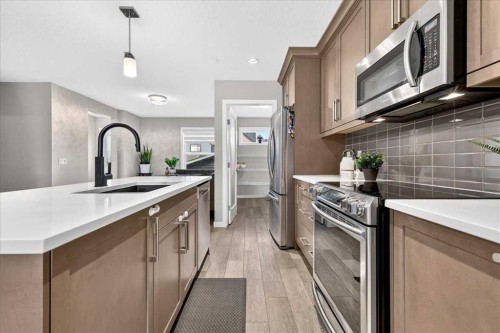 25 Masters Street Se, Calgary, AB - Indoor Photo Showing Kitchen With Upgraded Kitchen