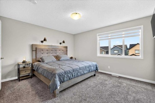 25 Masters Street Se, Calgary, AB - Indoor Photo Showing Bedroom