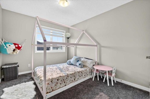 25 Masters Street Se, Calgary, AB - Indoor Photo Showing Bedroom