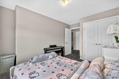 25 Masters Street Se, Calgary, AB - Indoor Photo Showing Bedroom