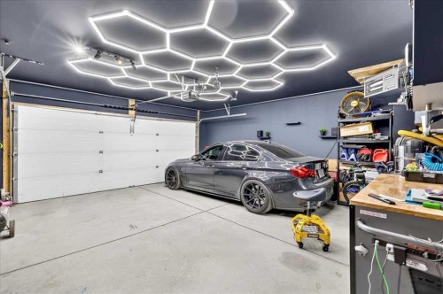 25 Masters Street Se, Calgary, AB - Indoor Photo Showing Garage