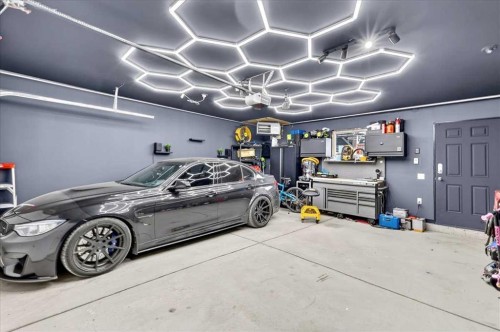 25 Masters Street Se, Calgary, AB - Indoor Photo Showing Garage