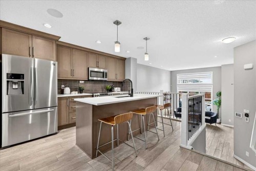 25 Masters Street Se, Calgary, AB - Indoor Photo Showing Kitchen With Stainless Steel Kitchen With Upgraded Kitchen
