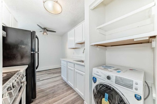 32-1703 11 Avenue Sw, Calgary, AB - Indoor Photo Showing Laundry Room