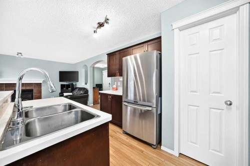 960 Copperfield Boulevard Se, Calgary, AB - Indoor Photo Showing Kitchen With Stainless Steel Kitchen With Double Sink