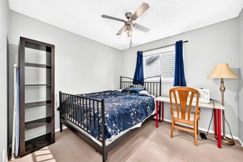960 Copperfield Boulevard Se, Calgary, AB - Indoor Photo Showing Bedroom