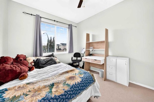 960 Copperfield Boulevard Se, Calgary, AB - Indoor Photo Showing Bedroom